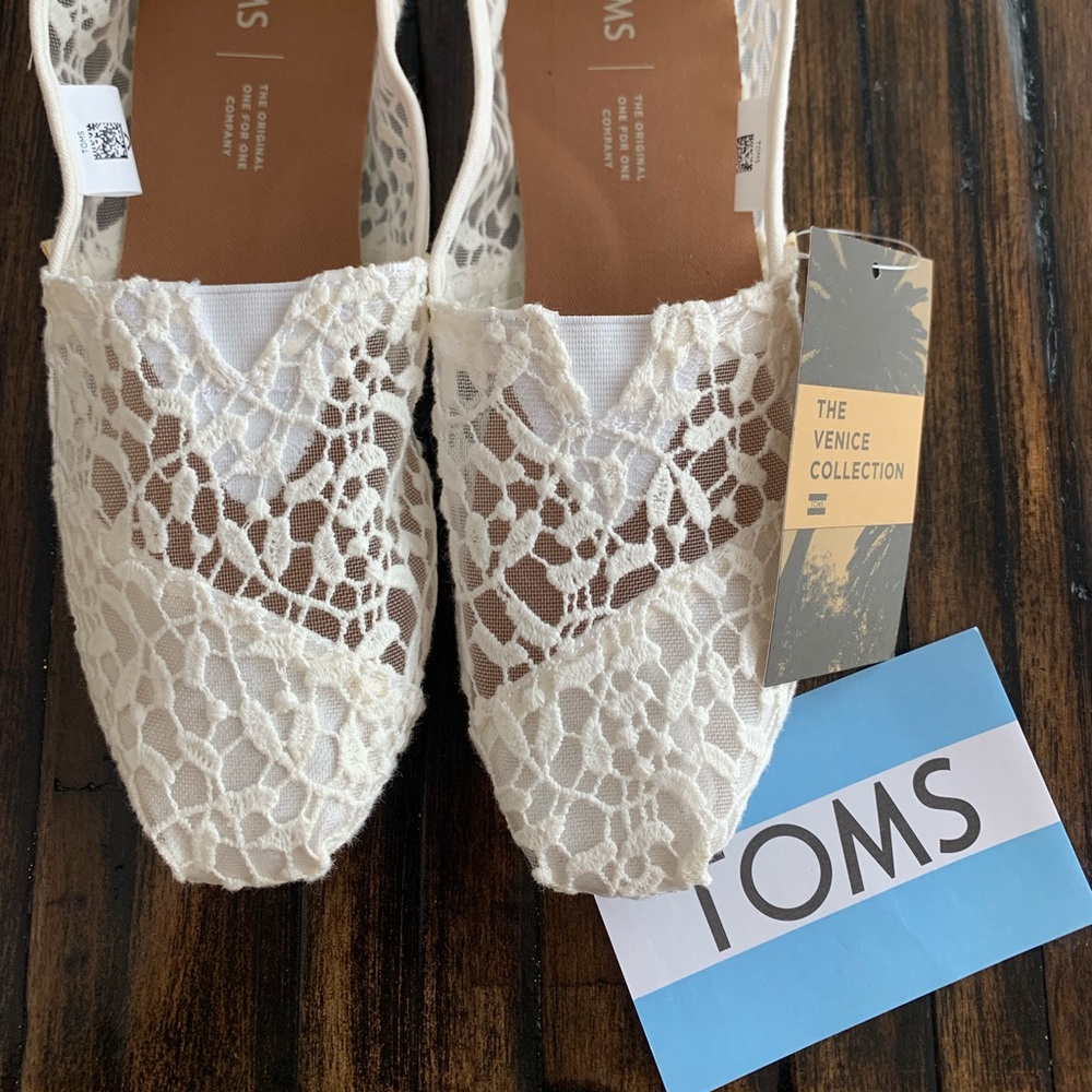 NWT Toms. White lace. Women’s size 8.5. In box.